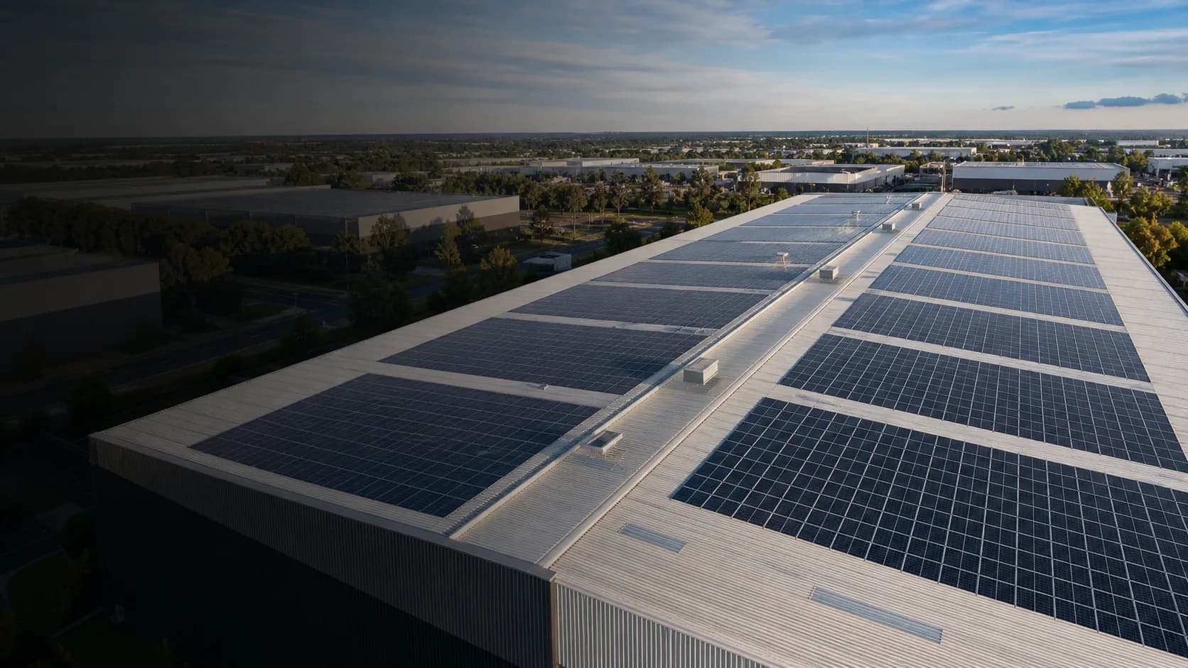 Commercial warehouse roof fitted with solar panels