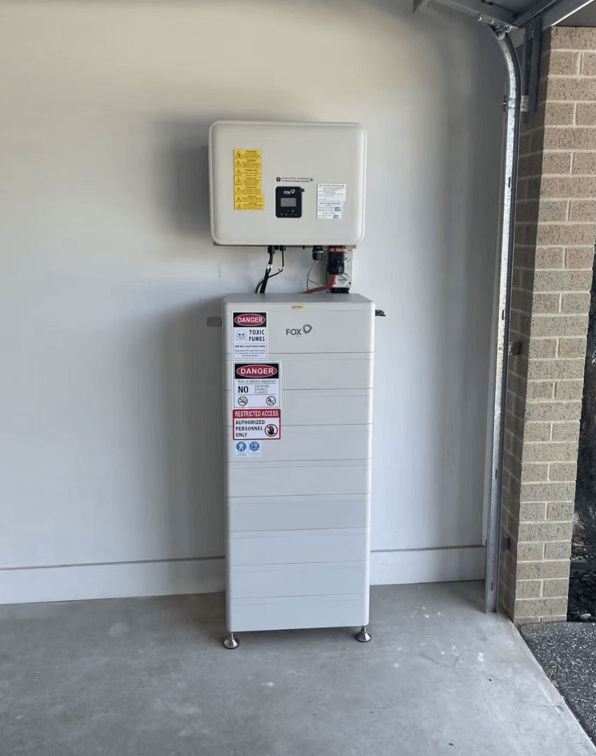 Fox ESS battery and inverter equipment installed in a covered exterior location