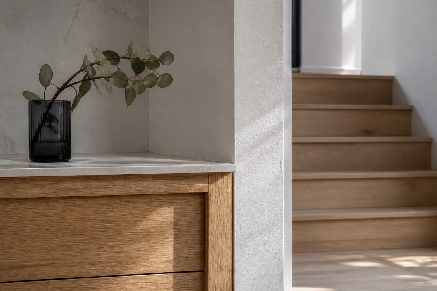 Interior detail concept showing oak joinery, stone and plaster